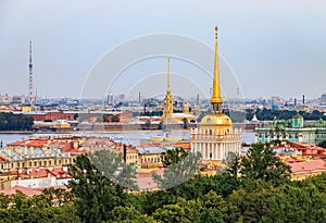 City skyline with the Admiralty spire, Peter and Paul Fortress, river Neva and Hermitage Winter Palace in Saint Petersburg, Russia