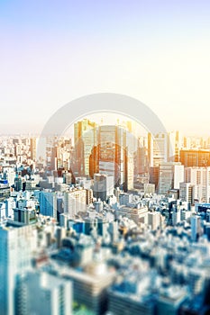 City skyline aerial view in tokyo, japan with miniature lens tilt shift blur effect