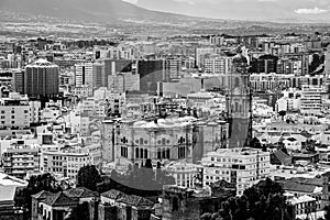 City skyline with the Cathedral of Malaga, Andalusia, Spain in black and white