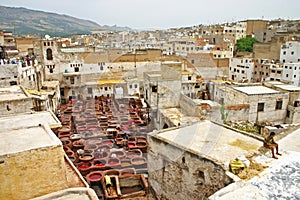 City skyline and dye pots at one of the tanneries in the ancient