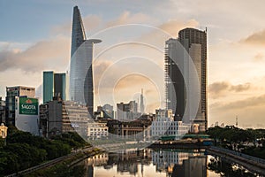 City Skyline of Ho Chi Minh cityscape at Sunset, Bitexco Tower in the financial area riverside. Saigon, Vietnam