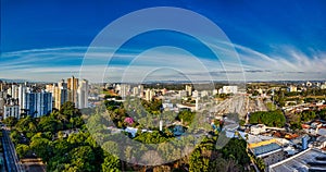 City skyline. Panoramic aerial shot of Sao Jose dos Campos city skyline - Sao Paulo, Brazil - at dusk with blue sky with few cloud