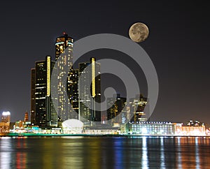 City skyline under moonlight