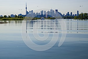 City skyscraper view cityscape background skyline silhouette, lake water and forest with copy space