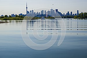 City skyscraper view cityscape background skyline silhouette, lake water and forest with copy space