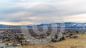 City  of Sparks Nevada cityscape with hotels and casinos and snow covered mountains in the background. photo
