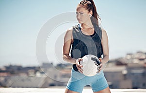 City sports, fitness and a woman with soccer ball in hands, earbuds and motivation for healthy lifestyle. Workout, focus