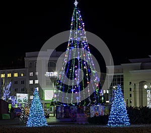 City square with christmas tree at night, city Kherson