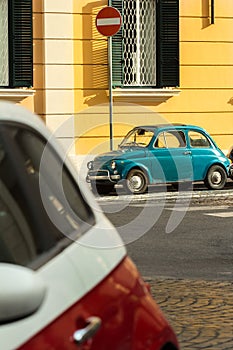 City street with classic vintage cars parking