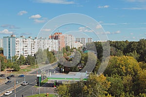 City street, fuel station and forest. Kazan, Russia