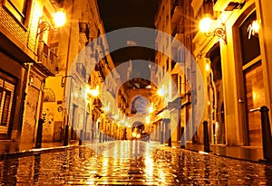 City street in night, Valencia, Spain photo