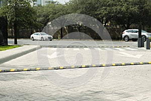 City street with striped plastic speed bump