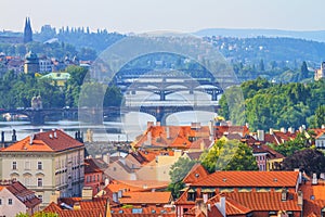 City summer landscape - top view of bridges over the River Vltava in the historical center of Prague