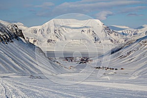 The city is surrounded by mountains. Longyearbyen, Spitsbergen