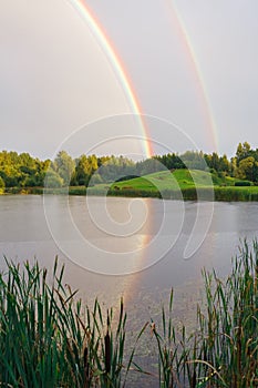 City Talsi, Latvia. Rainbow over the lake