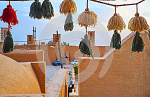 The city through the tassel wall hanging, Yazd, Iran