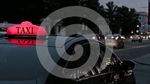 City Taxi sign in the night