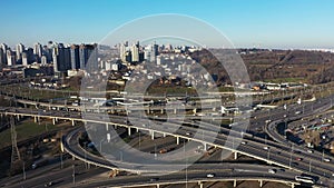 City traffic on the bridge. Highway interchange in big city aerial view.