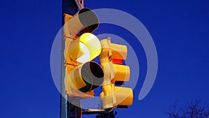 City traffic light turns from green to red