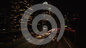 City traffic panning time lapse in downtown Los Angeles at night. 4K