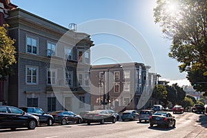 City traffic in San Francisco near the residential buildings in San Francisco California USA