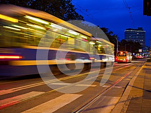 City tram, cable car at early morning drive up to a stop