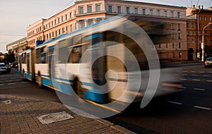 City trolleybus with the effect of blurring