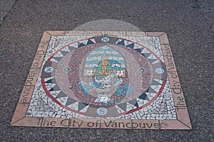 City of Vancouver seal in sidewalk