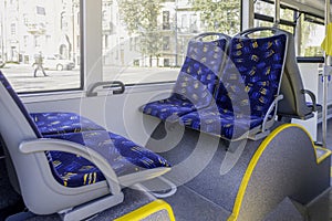 City vehicle bus salon with empty passangers seats