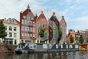 City view of Amsterdam canal and typical houses, Holland, Nether