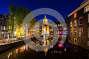 City view of Amsterdam, the Netherlands with Amstel river at night