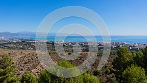 City view of buildings and sea on a sunny day in Torremolinos, Malaga, Spain