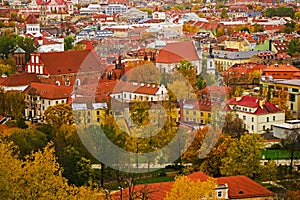 City view and city scape of Vilnius, Lithuania. Three crosses and autumn forest photo