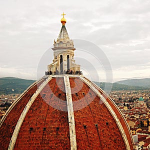 City view and Firenze Duomo Cupola. Aged photo.
