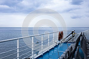 City view of Izmir from ferryboat. Cold grey winter Aegean sea