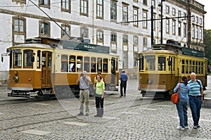 City view Porto with ancient trams and tourists