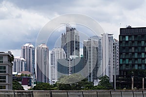 City view of skyscarpers in overcast sky.