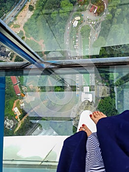 City view through transparent glass of Sky box in Menara KL tower, Kuala Lumpur