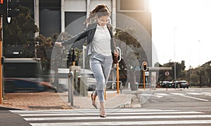 City, walking and business woman on a crosswalk with travel, commute and urban journey. Running, outdoor and female