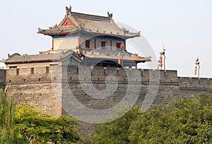 City Wall, Xian, Shaanxi Province, China. Watchtower on Xian city wall overlooking trees.