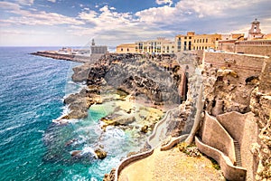 City walls, lighthouse and harbor in Melilla.