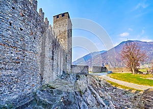 The city walls and Torre Nera  tower of Castelgrande fortress, Bellinzona, Switzerland photo