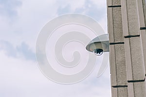 City web camera for surveillance on the background of the building and the sky