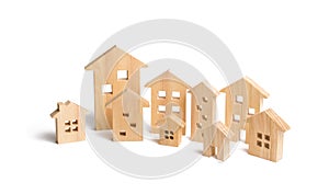 City of wooden houses on a white background. The concept of urban planning, infrastructure projects.