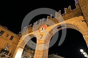 citygate of Verona at night