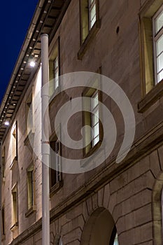 citylights at night with facades and architecture of a marketplace