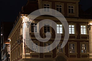 citylights at night with facades and architecture of a marketplace