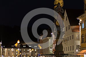 citylights at night with facades and architecture of a marketplace