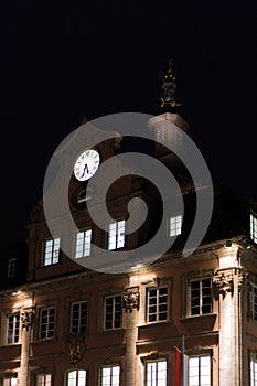 citylights at night with facades and architecture of a marketplace