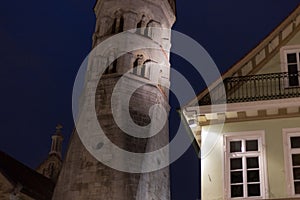 citylights at night with facades and architecture of a marketplace